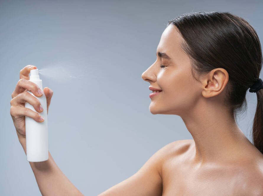 Smiling female with a ponytail doing a beauty procedure